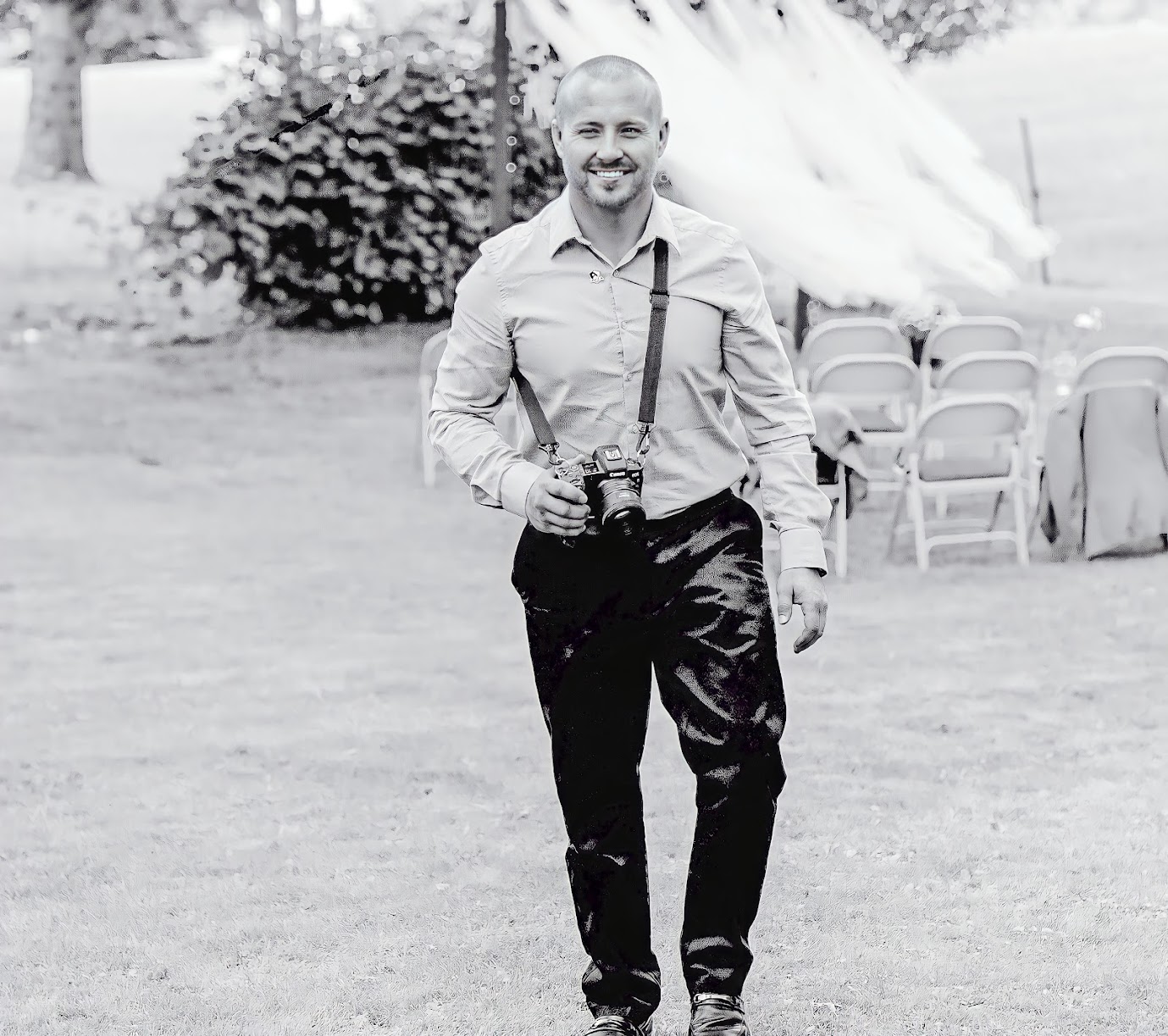 Jeff with camera at a wedding venue