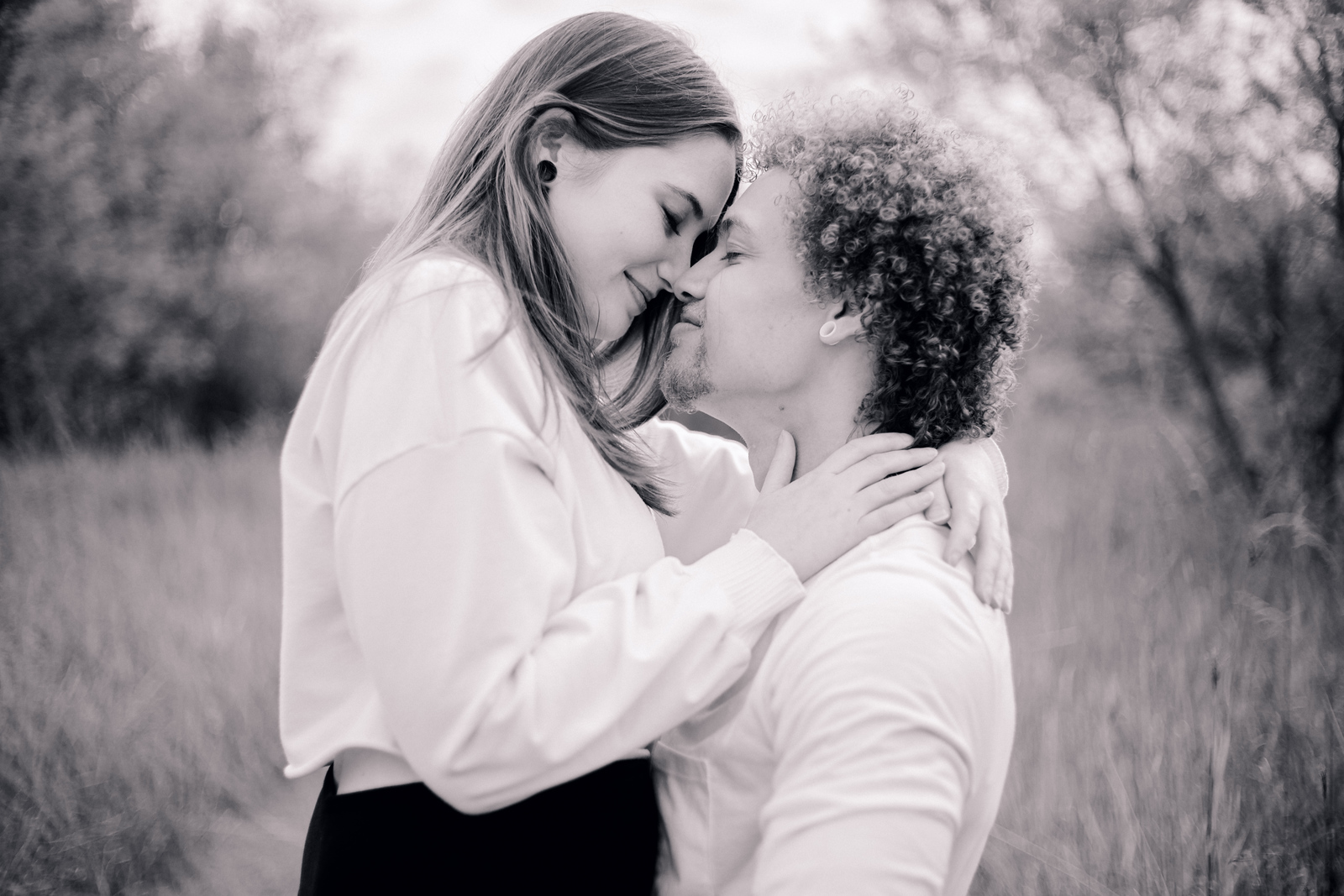Couple engagement session in the Wisconsin grasslands